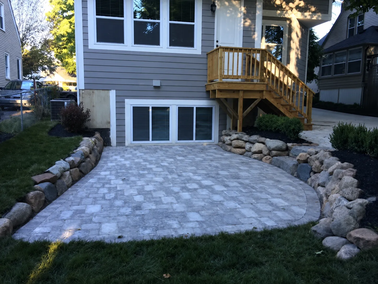 Patio builders in Fort Wayne creating a custom outdoor living area for a local homeowner